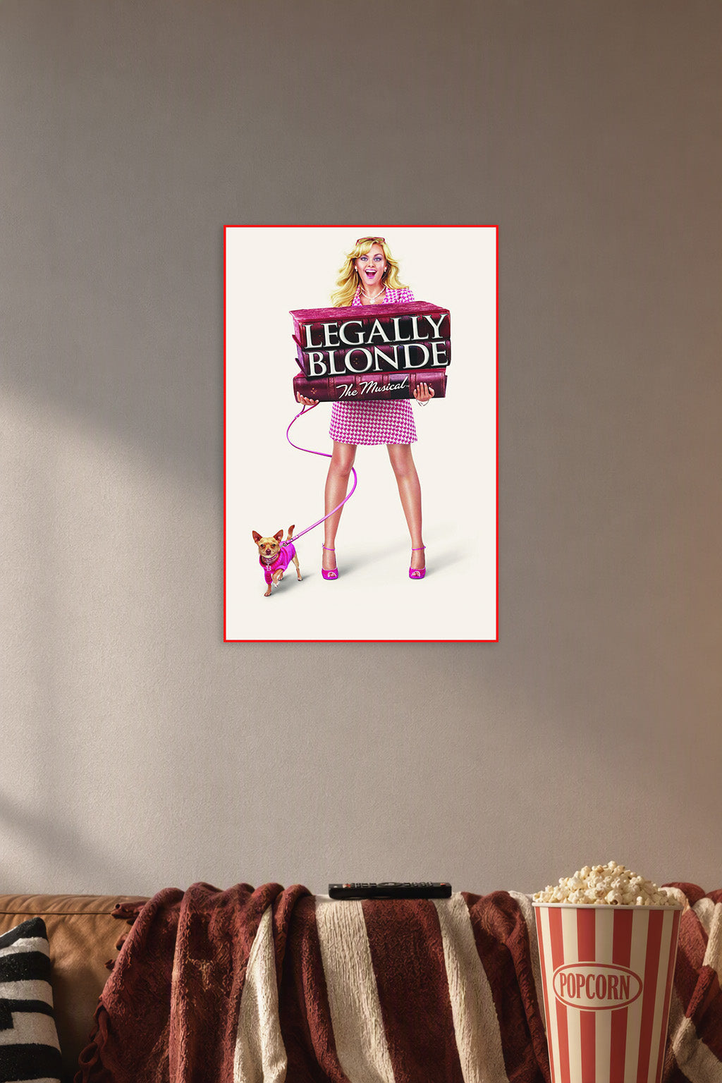 Legally Blonde The Musical in a cozy movie room above a brown sofa with popcorn.