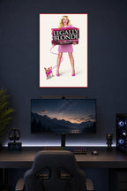 Legally Blonde The Musical in a gaming desk setup above a monitor.