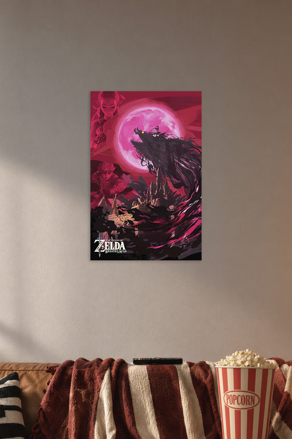 Legend of Zelda Breath of the Wild in a cozy movie room above a brown sofa with popcorn.