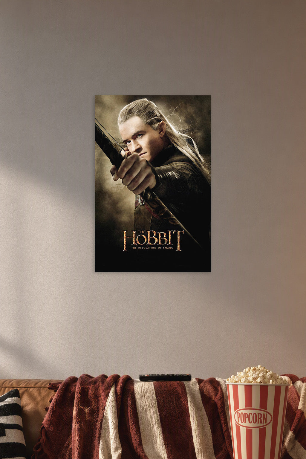 Legolas in a cozy movie room above a brown sofa with popcorn.