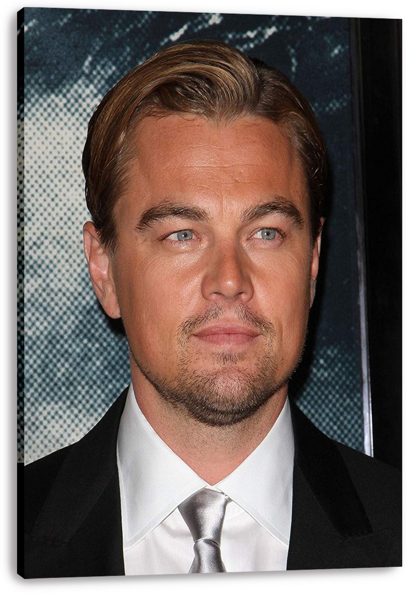 Leonardo DiCaprio canvas wall art print with a close-up formal portrait in a black suit and silver tie.