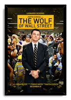The Wolf of Wall Street framed wall art print with Leonardo DiCaprio centered among partygoers, confetti, and bold yellow title text.
