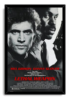 Lethal Weapon framed wall art print presents black-and-white portraits of Mel Gibson and Danny Glover with a handgun and red movie title.