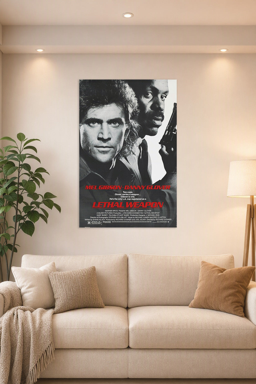 Lethal Weapon Mel Gibson Danny Glover in a bright living room above a beige sofa.