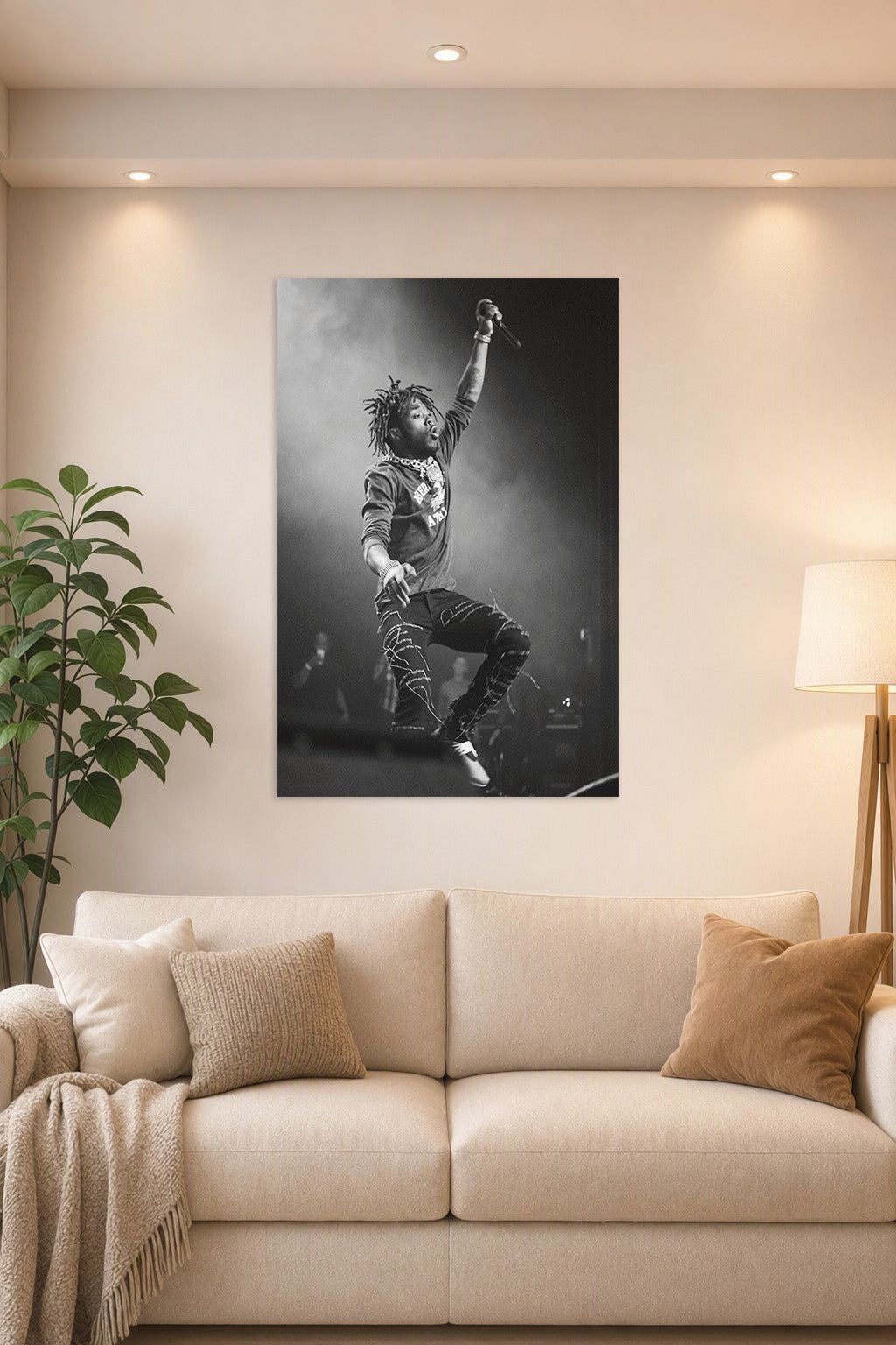 Lil Uzi Vert in a bright living room above a beige sofa.