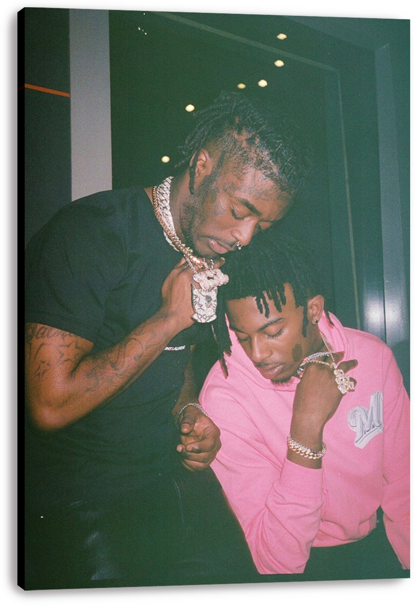 Lil Uzi Vert and Playboi Carti wall art print on stretched canvas depicts the pair with jewelry, a black shirt, and a pink hoodie.