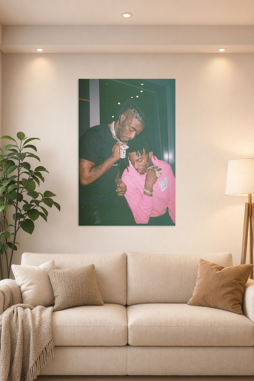 Lil Uzi Vert and Playboi Carti in a bright living room above a beige sofa.