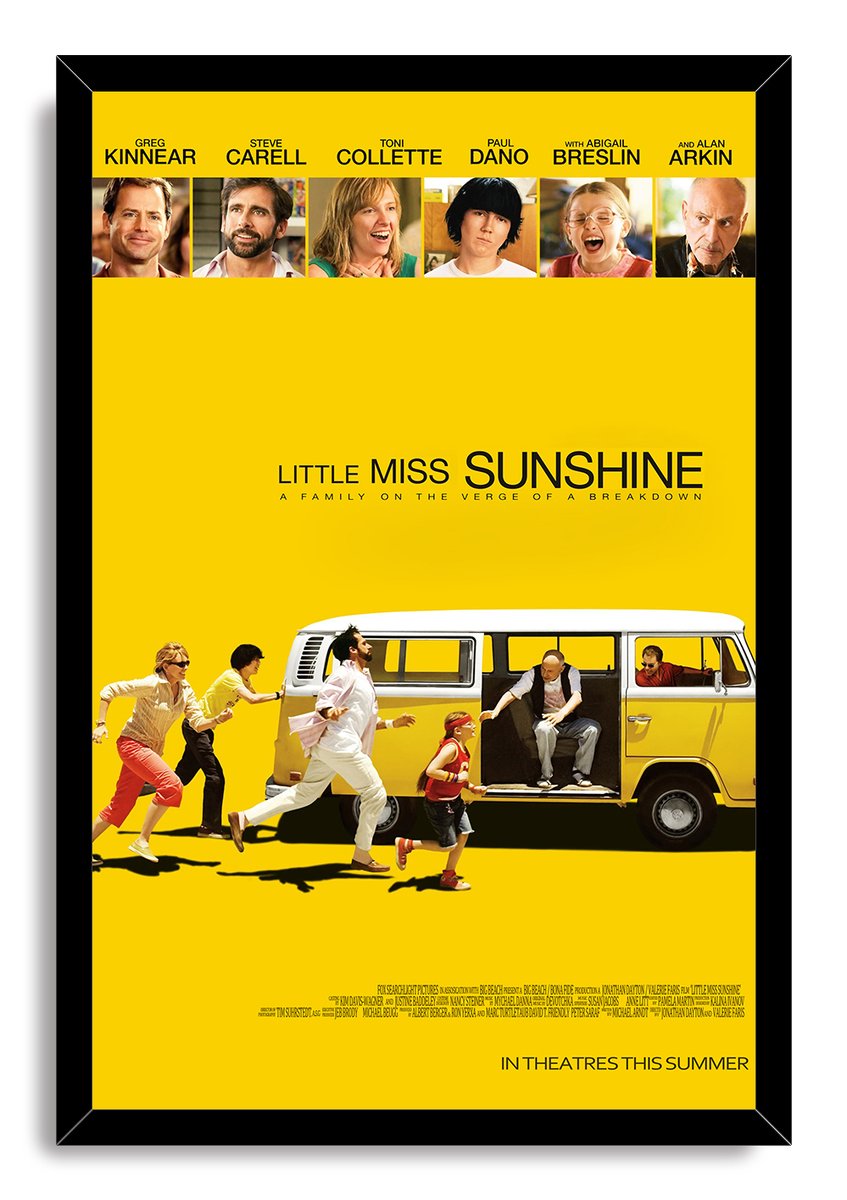 Little Miss Sunshine framed wall art print in a black frame, featuring cast portraits and a family beside a yellow VW bus.