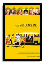 Little Miss Sunshine framed wall art print in a black frame, featuring cast portraits and a family beside a yellow VW bus.