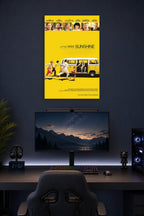 Little Miss Sunshine Movie Poster in a gaming desk setup above a monitor.