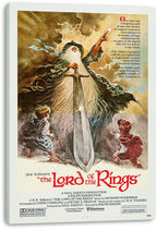 The Lord of the Rings canvas wall art print displays Gandalf in dark robes with a large sword and two hobbits, mounted on a white-edged canvas.