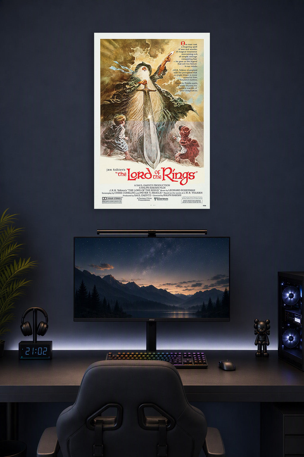 Lord of the Rings Gandalf in a gaming desk setup above a monitor.