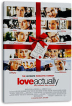 Love Actually wall art print on a thick canvas displays cast portraits, red ribbon cross, bow, gift tag, and bold title.