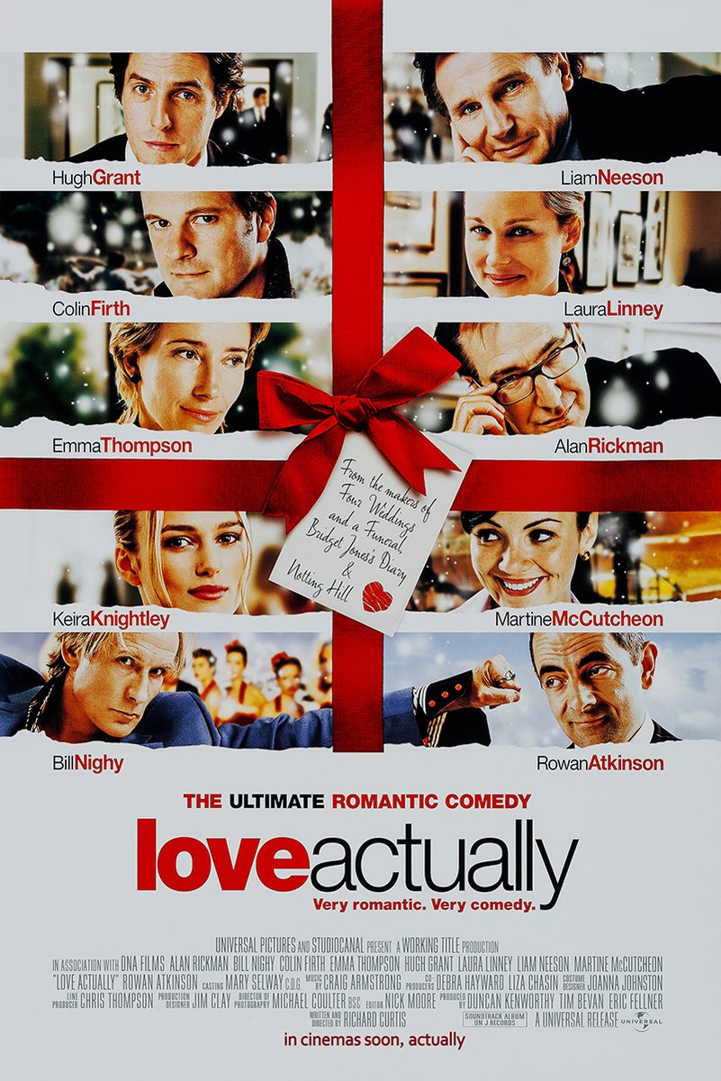 Love Actually poster with eight cast portraits arranged around a red gift ribbon, bow, handwritten tag, and title.