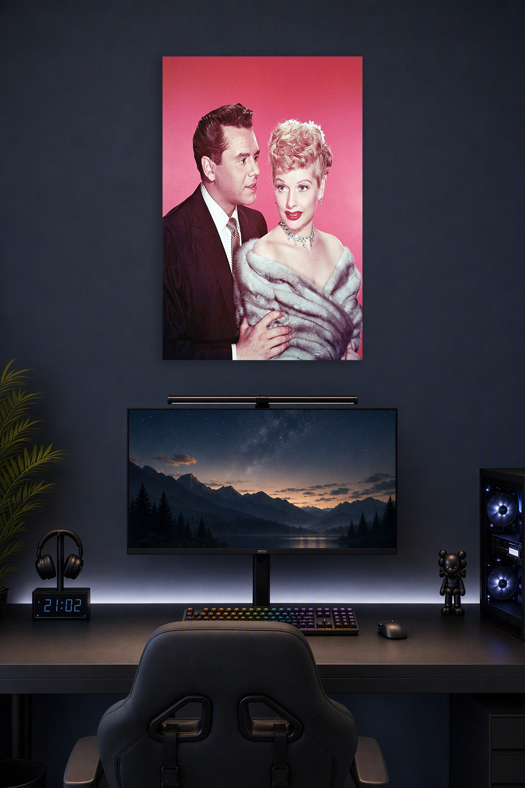 Lucille Ball Desi Arnaz in a gaming desk setup above a monitor.