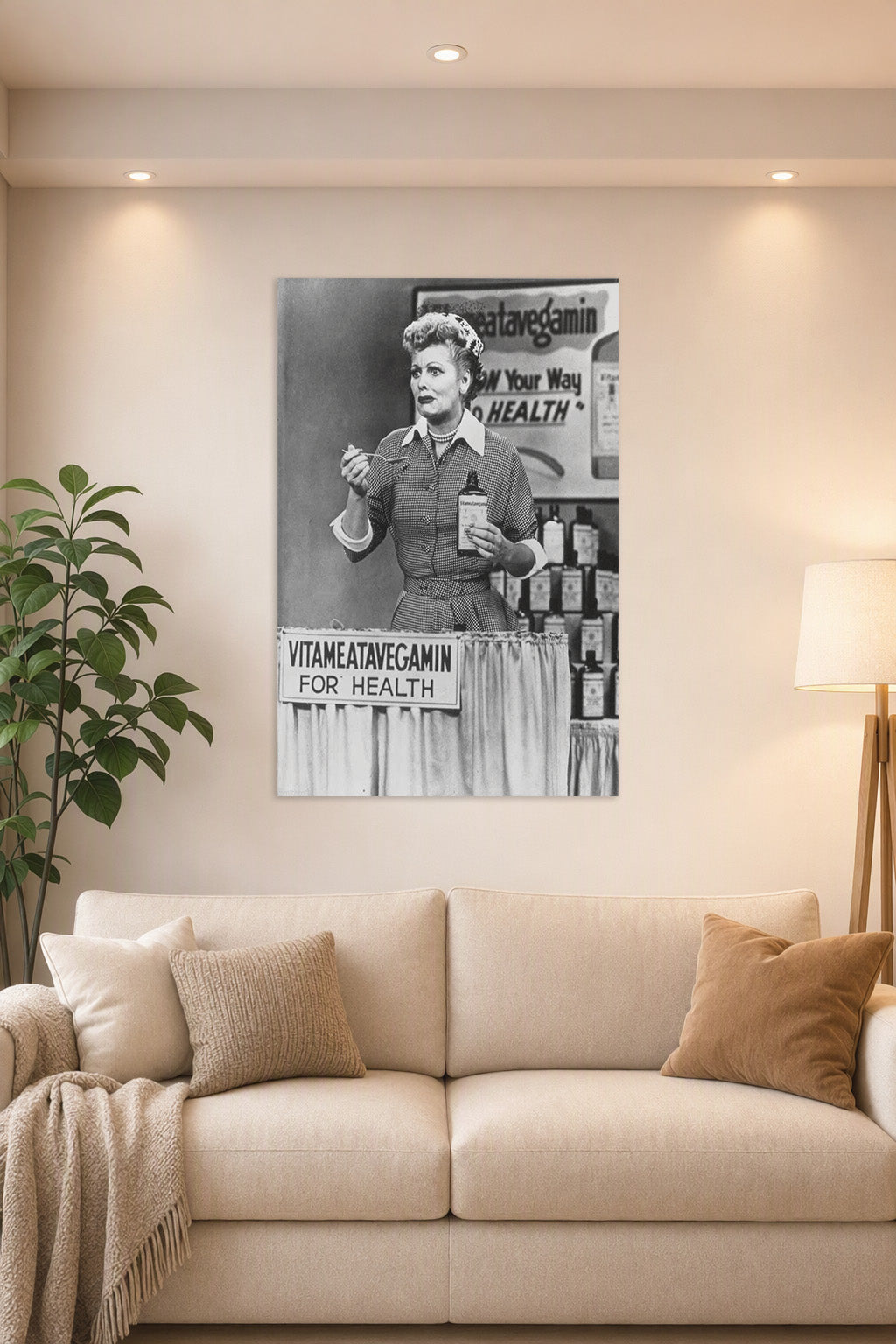 Lucille Ball I Love Lucy Vitameatavegamin in a bright living room above a beige sofa.