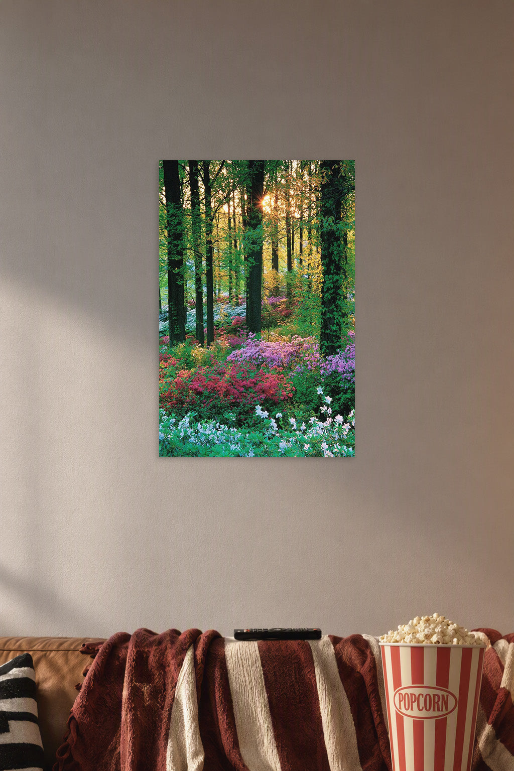 Lush Forest Bloom in a cozy movie room above a brown sofa with popcorn.