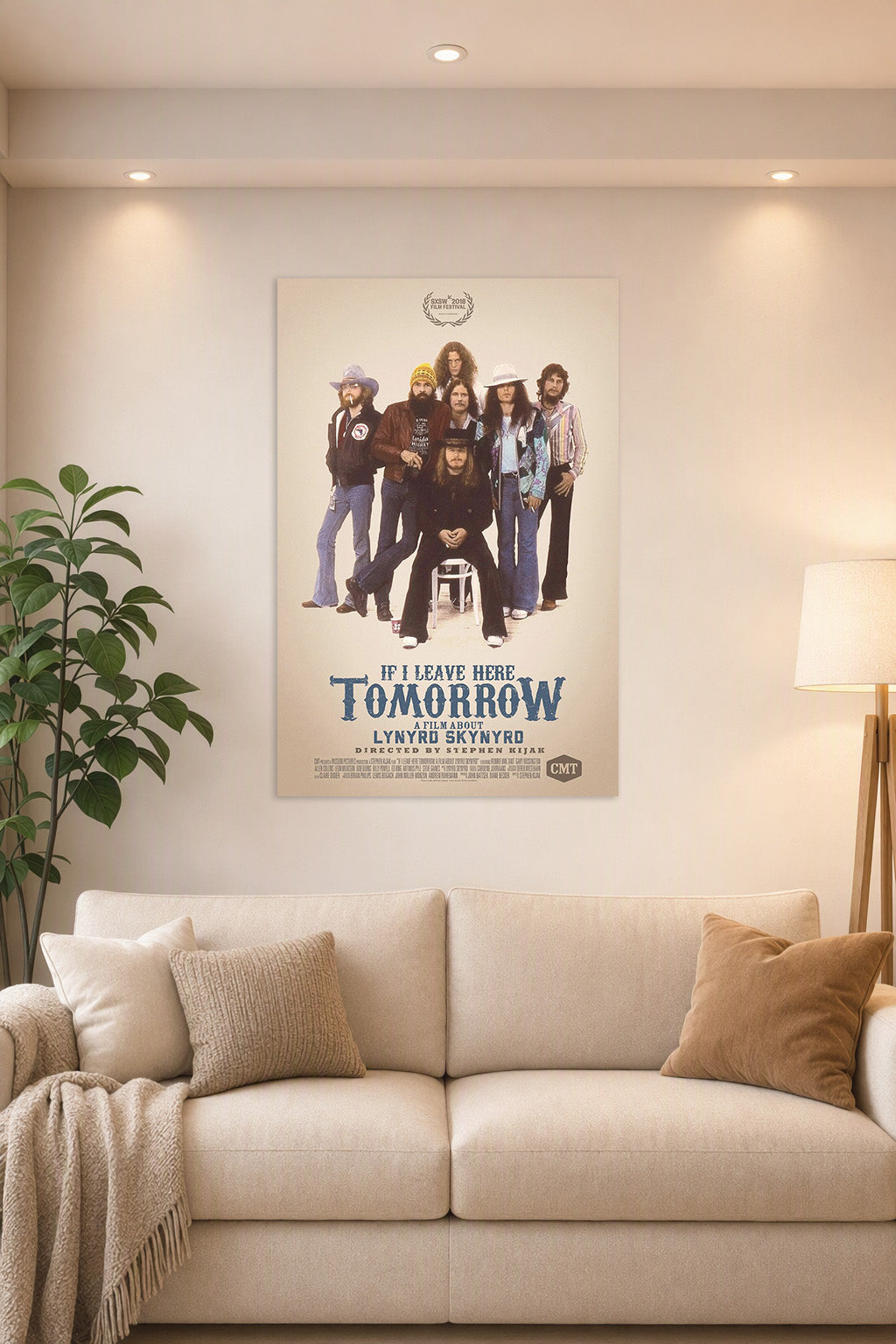 Lynyrd Skynyrd Band 'If I Leave Here Tomorrow' Movie Poster art poster print in a bright living room above a beige sofa.