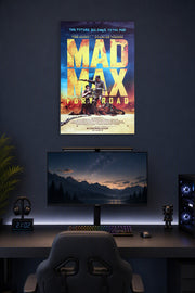 Mad Max: Fury Road in a gaming desk setup above a monitor.