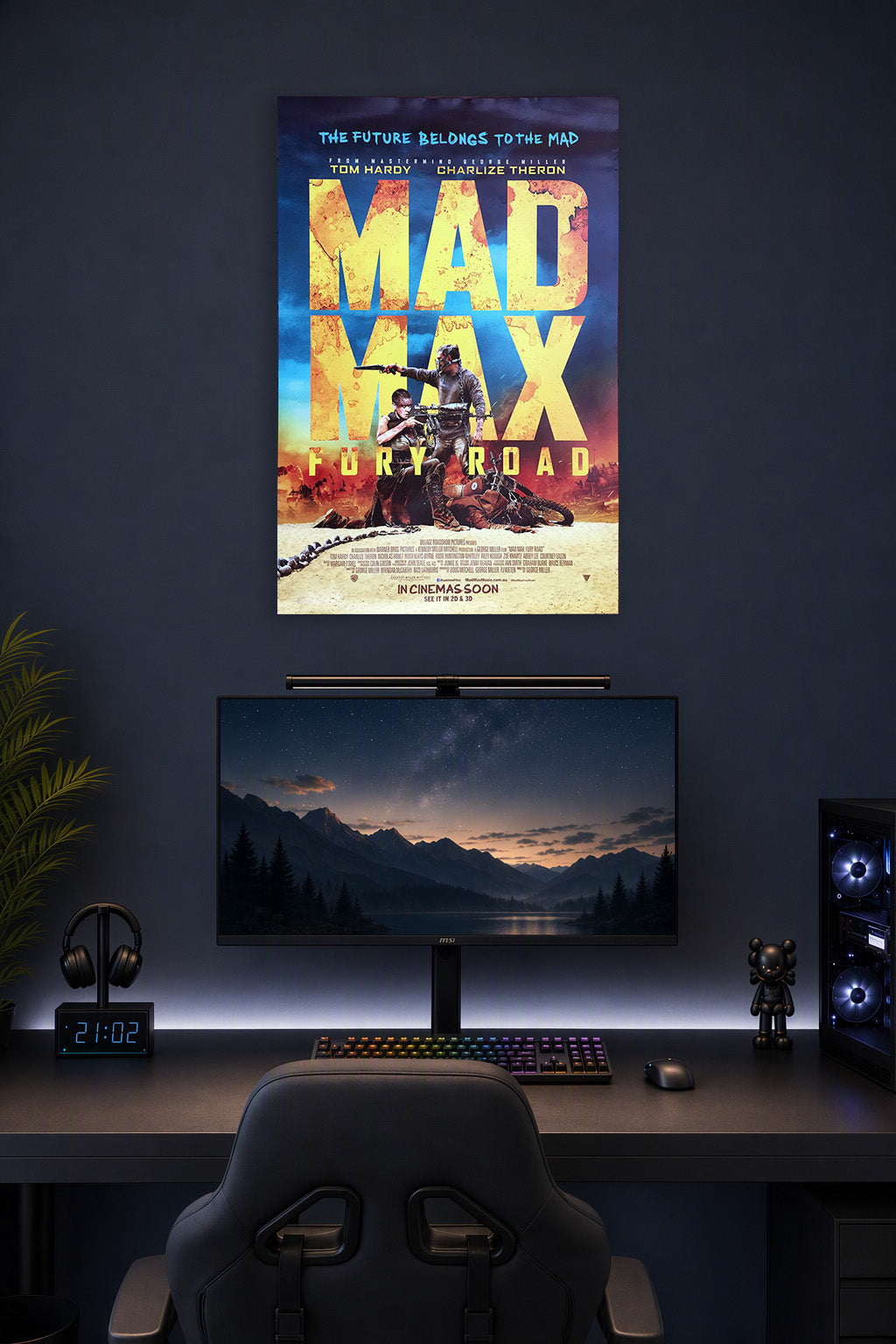 Mad Max: Fury Road in a gaming desk setup above a monitor.