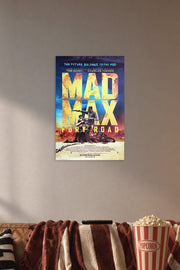 Mad Max: Fury Road in a cozy movie room above a brown sofa with popcorn.