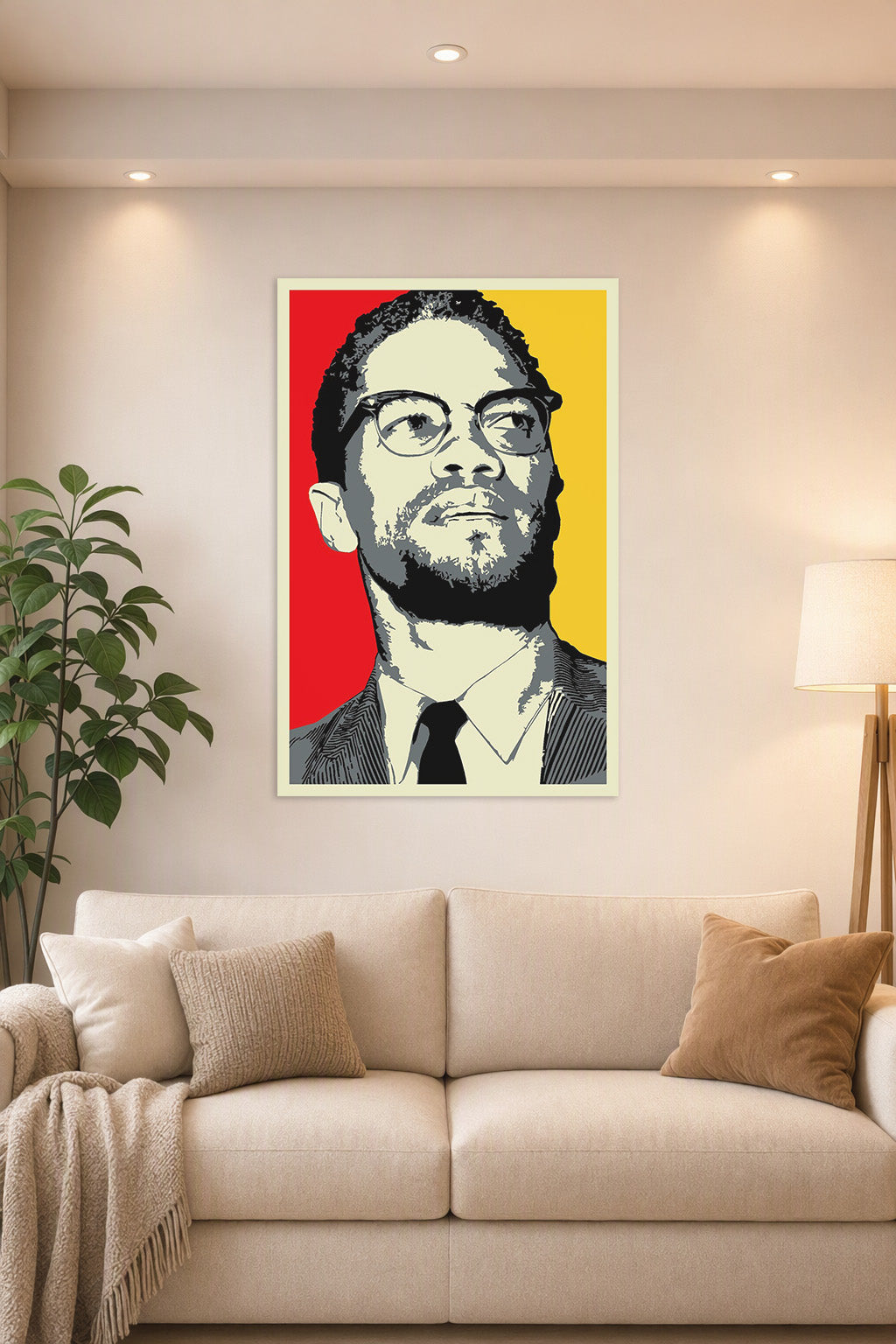Malcolm X in a bright living room above a beige sofa.