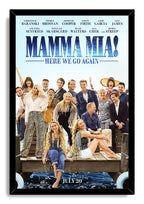 Mamma Mia! Here We Go Again framed wall art print with a black border, ensemble cast on a dock, and bright blue sea.