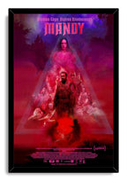 Mandy movie poster wall art print presented in a black frame, with vivid magenta, red, and purple character collage artwork.