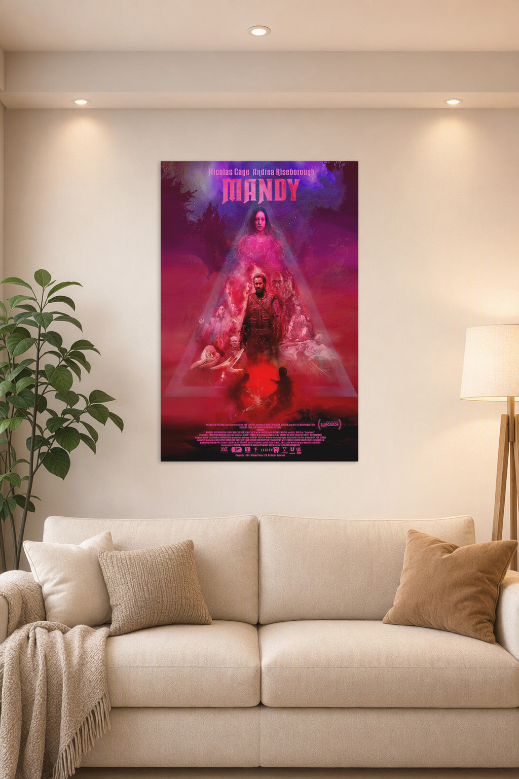 Mandy Movie Poster in a bright living room above a beige sofa.