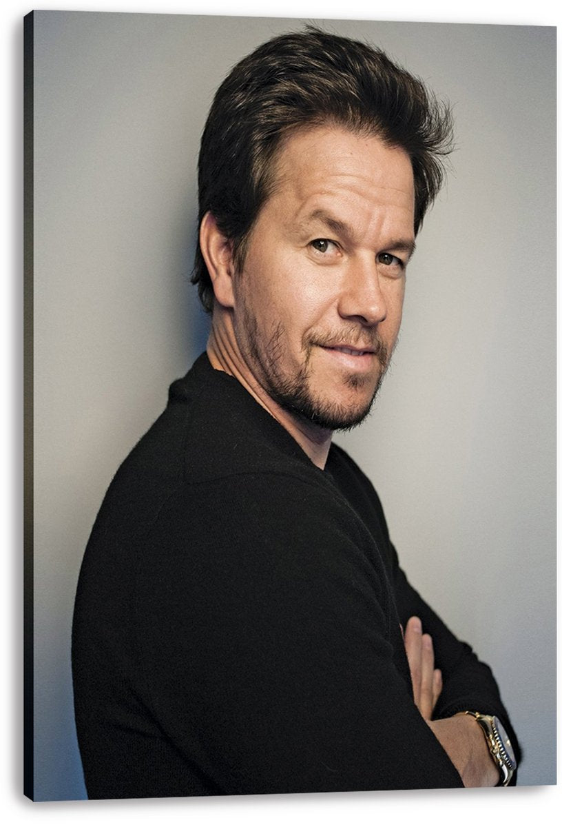 Mark Wahlberg canvas wall art print displaying a close portrait of the actor in a black sweater with folded arms.