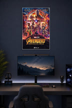 Marvel Avengers Infinity War Movie Poster in a gaming desk setup above a monitor.