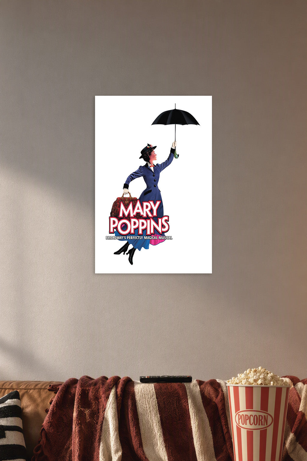 Mary Poppins in a cozy movie room above a brown sofa with popcorn.