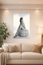 Mary Tyler Moore in a bright living room above a beige sofa.