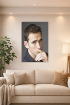 Matt Dillon in a bright living room above a beige sofa.