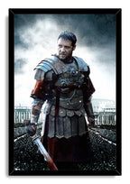 Maximus Gladiator framed wall art print depicts an armored warrior holding a sword, with a Roman arena and dark cloud-filled sky behind him.