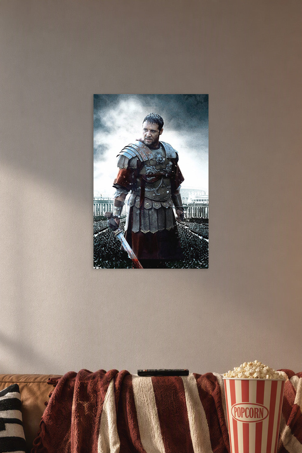 Maximus Gladiator in a cozy movie room above a brown sofa with popcorn.