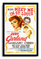 Meet Me in St. Louis framed wall art print with Judy Garland, child and romantic couple portraits, bold red typography, and a black frame.