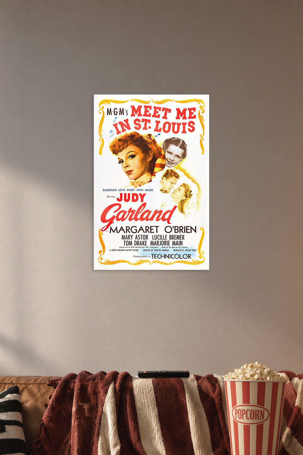 Meet Me in St. Louis Judy Garland in a cozy movie room above a brown sofa with popcorn.