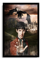 Merlin framed wall art print features a young sorcerer reaching forward beneath a dragon over misty hills and a castle.