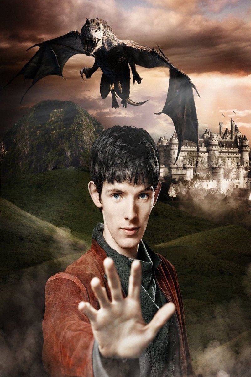 Merlin wall art print portrays a young dark-haired man raising his hand beneath a flying dragon and castle at dusk.