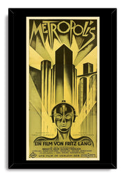 Metropolis movie poster framed wall art print in a black frame, with a robot portrait, angular towers, and German film text.