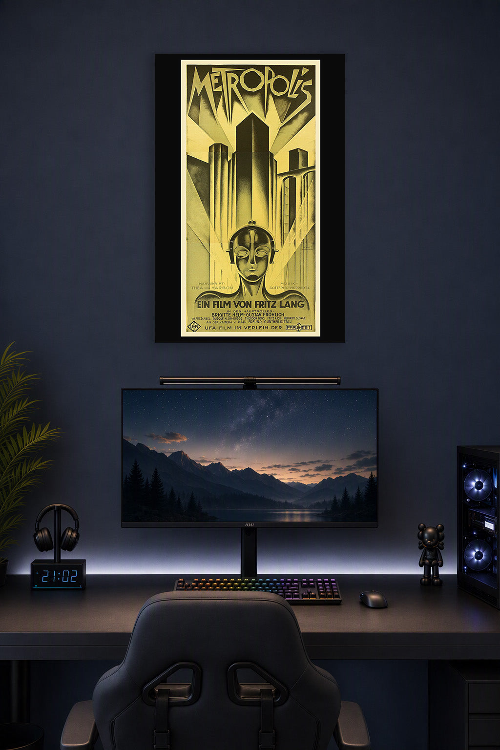 Metropolis Movie Poster in a gaming desk setup above a monitor.
