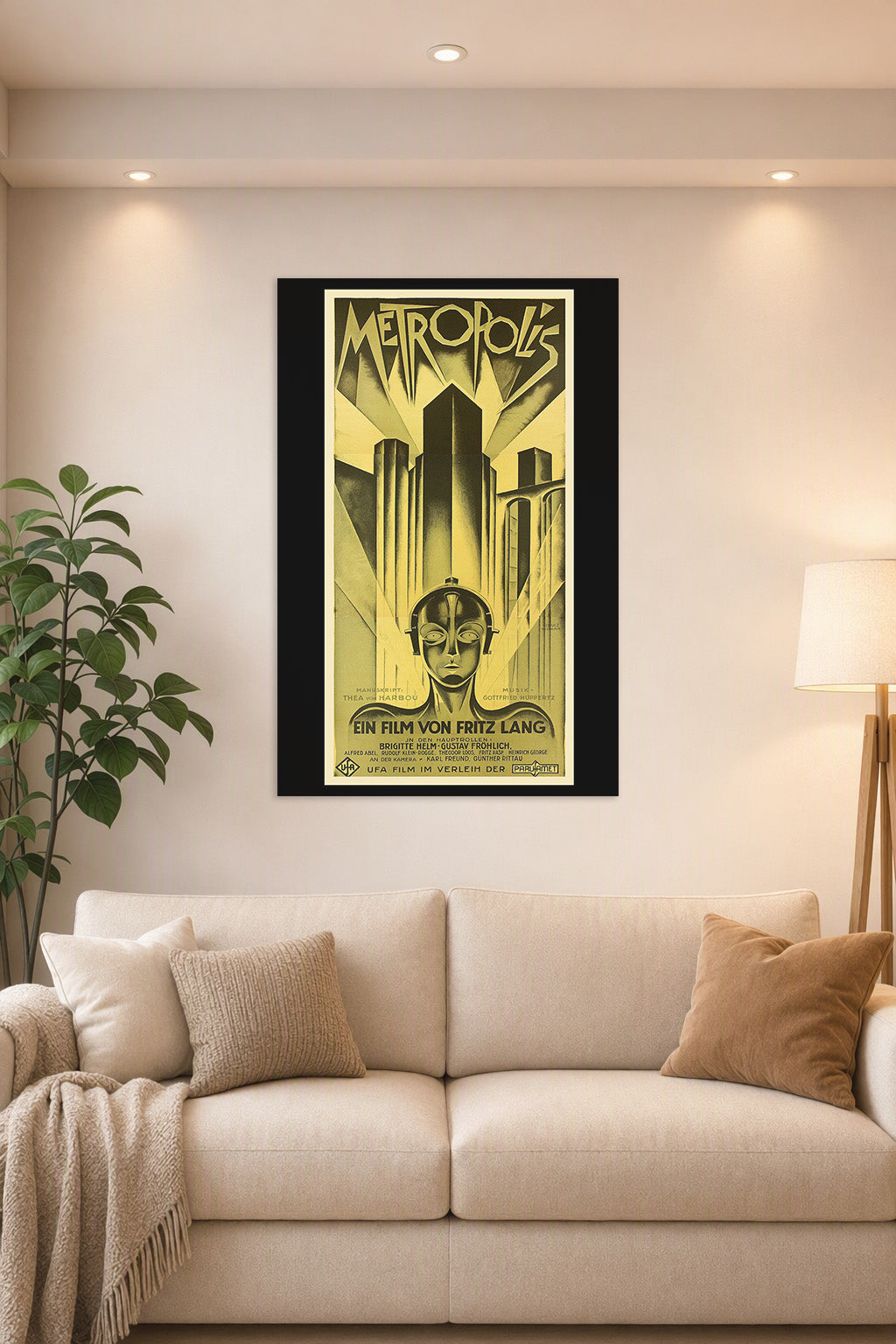Metropolis Movie Poster in a bright living room above a beige sofa.