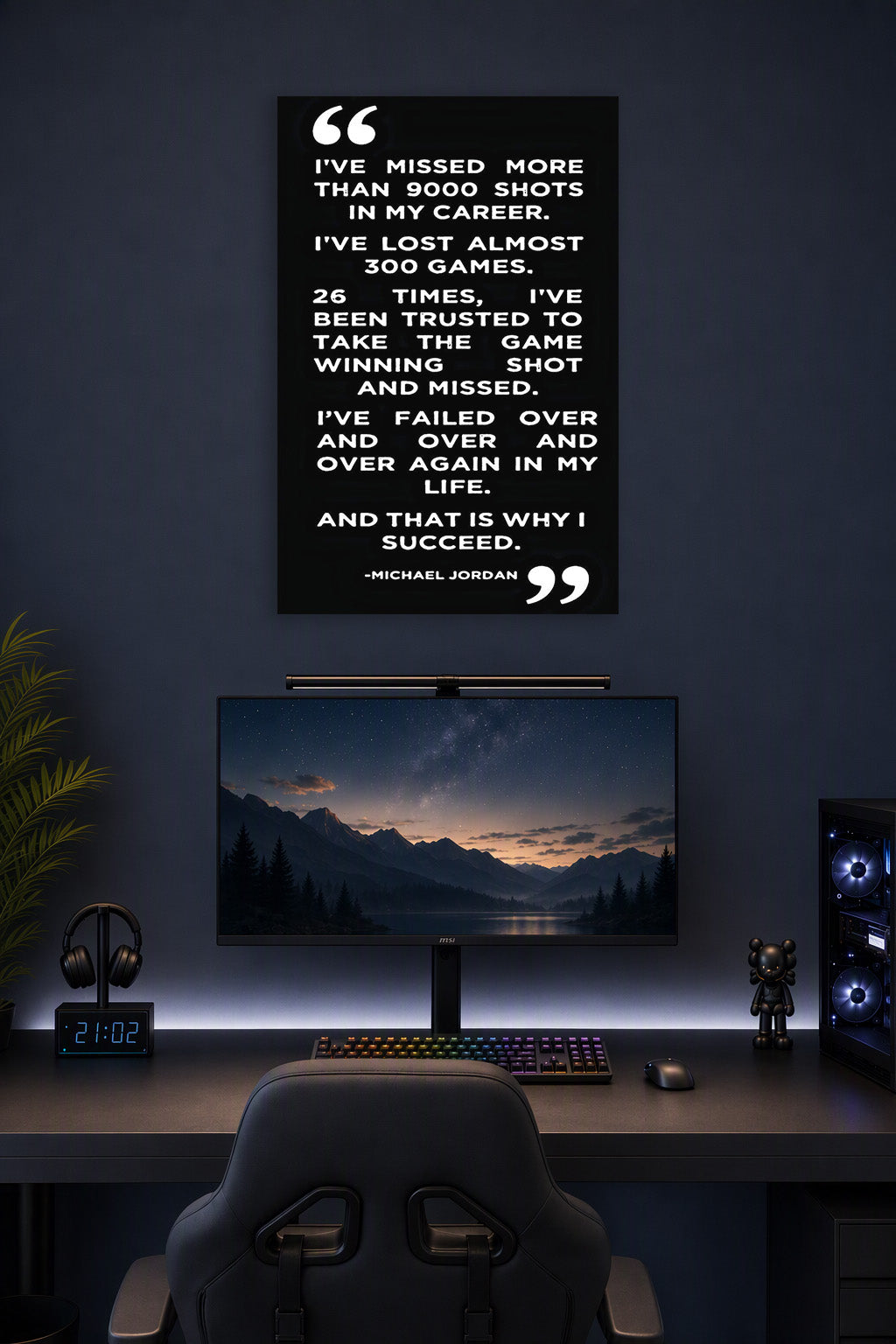 Michael Jordan Inspirational Quote in a gaming desk setup above a monitor.