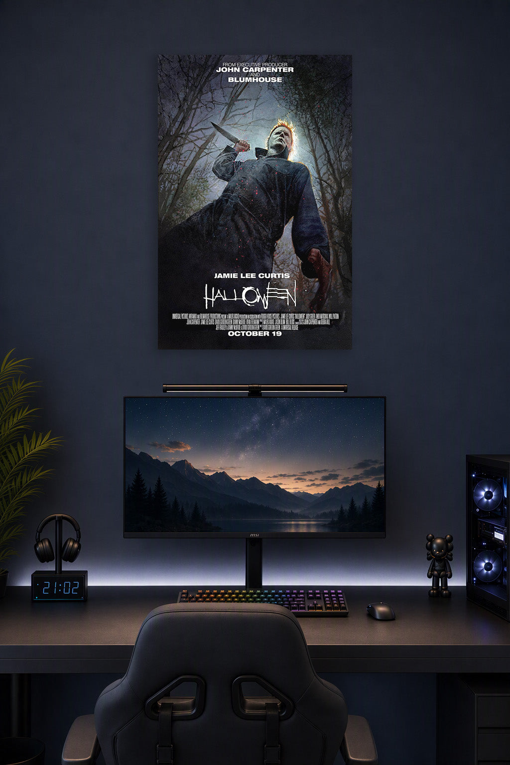 Michael Myers Halloween Movie in a gaming desk setup above a monitor.
