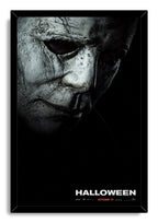 Michael Myers Halloween framed wall art print featuring a distressed mask against a black background with white title lettering.