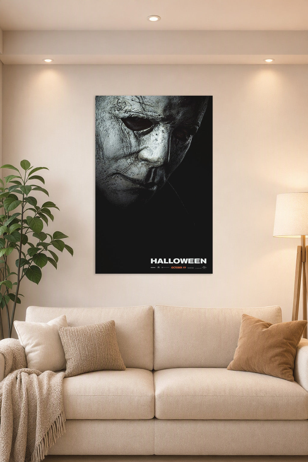 Michael Myers Halloween Movie Poster in a bright living room above a beige sofa.