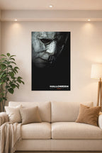 Michael Myers Halloween Movie Poster in a bright living room above a beige sofa.