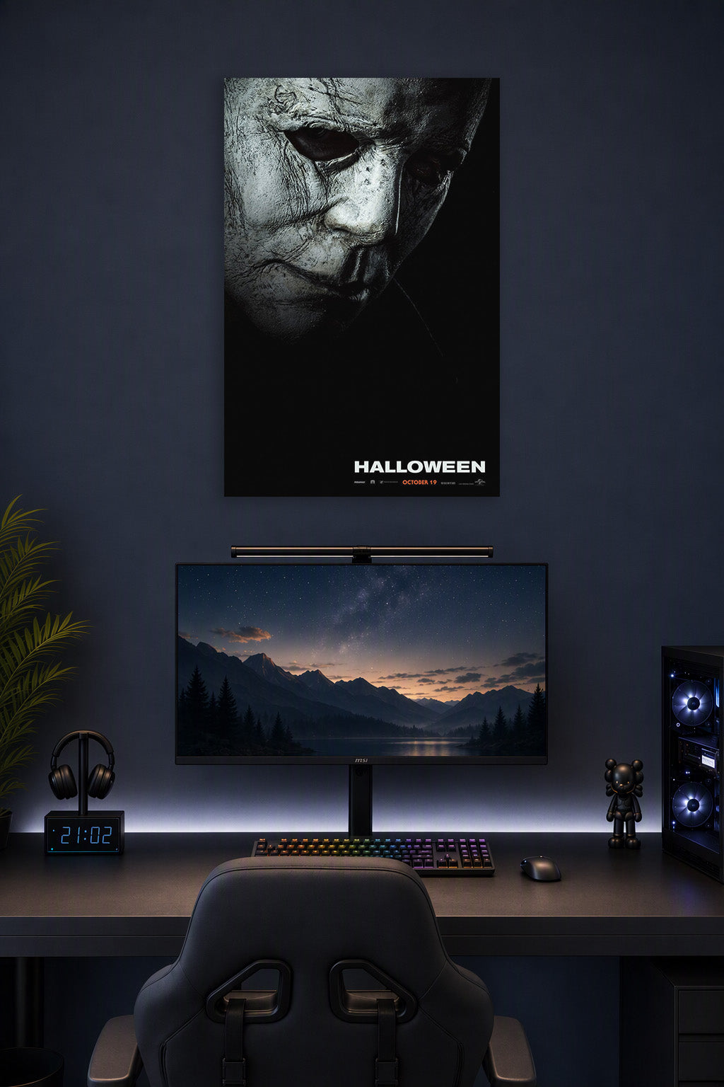Michael Myers Halloween Movie Poster in a gaming desk setup above a monitor.