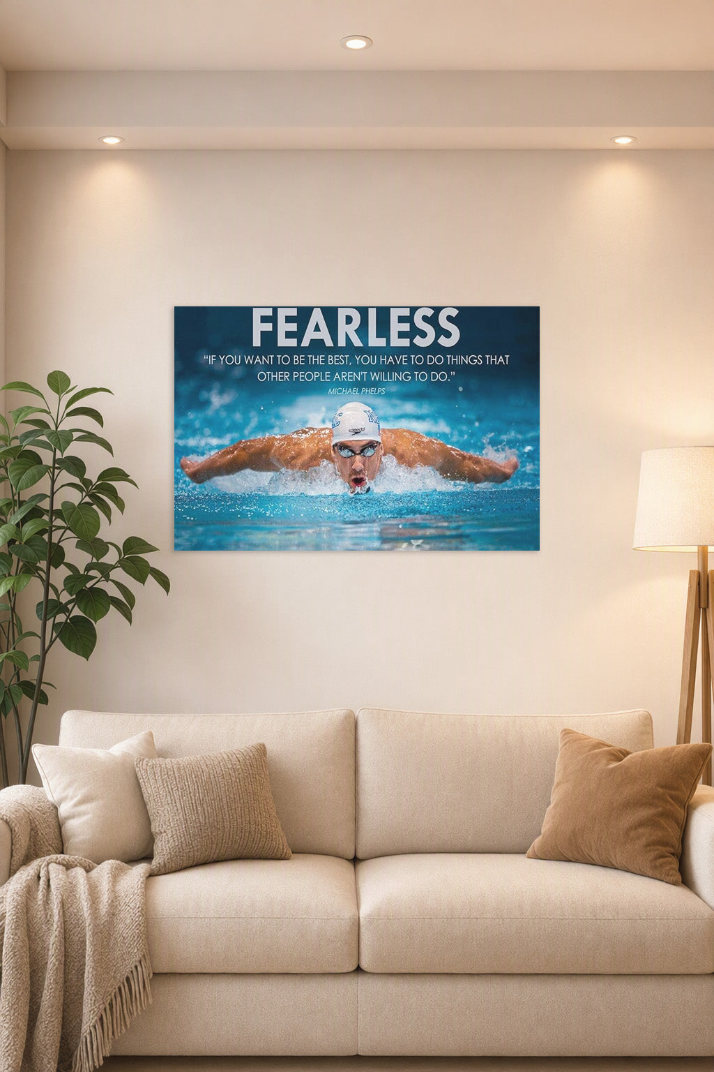Michael Phelps Motivational Quotes HD Poster in a bright living room above a beige sofa.